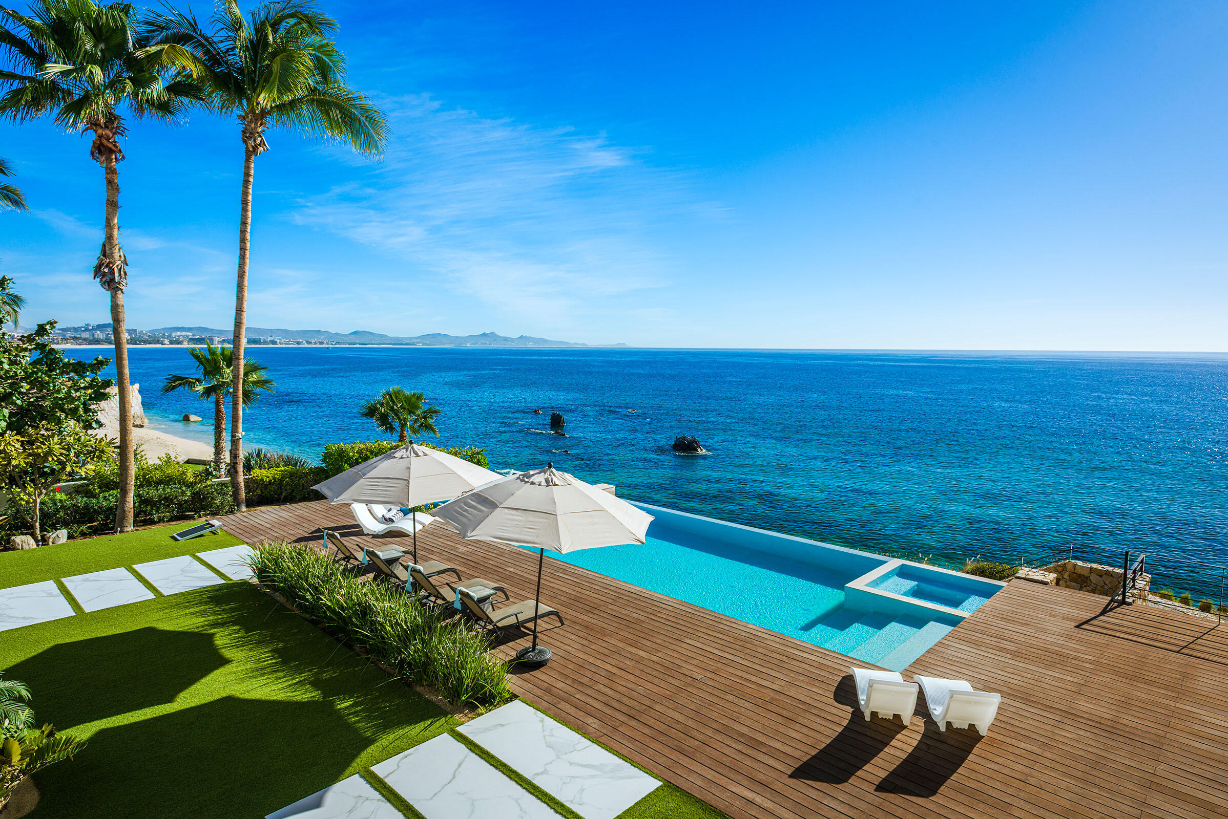 Cabo Luxury La Caleta Casa Hendo is a stunning oceanfront estate perched above a swimmable cove, offering breathtaking Sea of Cortez for sale