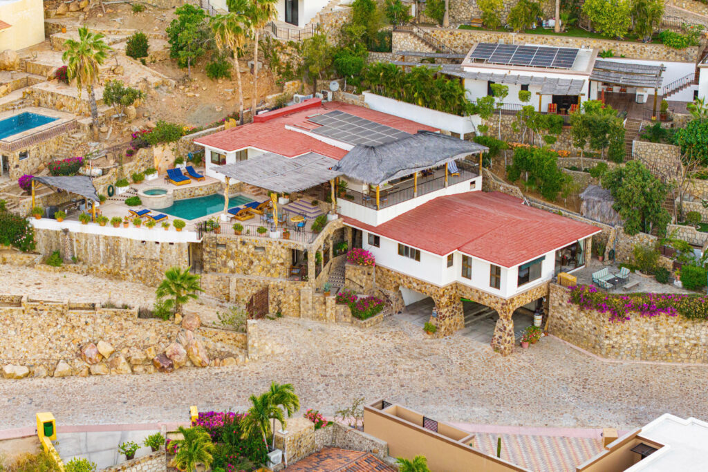 Cabo Luxury Pedregal Csl Villa Felicidad is a 5-bedroom, 5.5-bath residence in Pedregal that combines scale, location, and proven income potential. Set just minutes from the main gate and within walking distance to the marina, it offers effortless access to Cabo's best dining and nightlife while maintaining privacy. The home features a private pool, expansive terraces, and panoramic marina – 25 Camino Grande Pedregal, Cabo San Lucas, BS