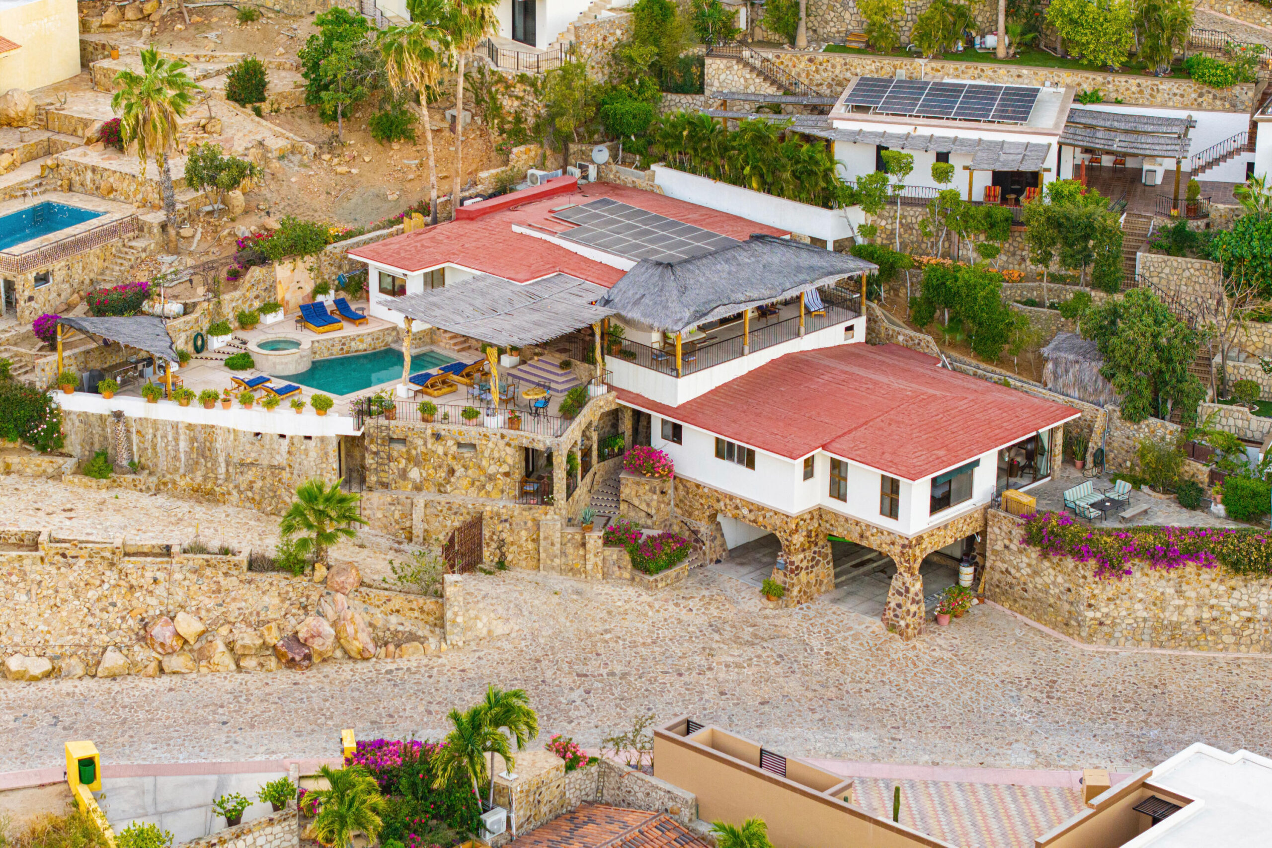 Cabo Luxury Pedregal Csl Villa Felicidad is a 5-bedroom, 5.5-bath residence in Pedregal that combines scale, location, and proven income potential. Set just minutes from the main gate and within walking distance to the marina, it offers effortless access to Cabo's best dining and nightlife while maintaining privacy. The home features a private pool, expansive terraces, and panoramic marina for sale