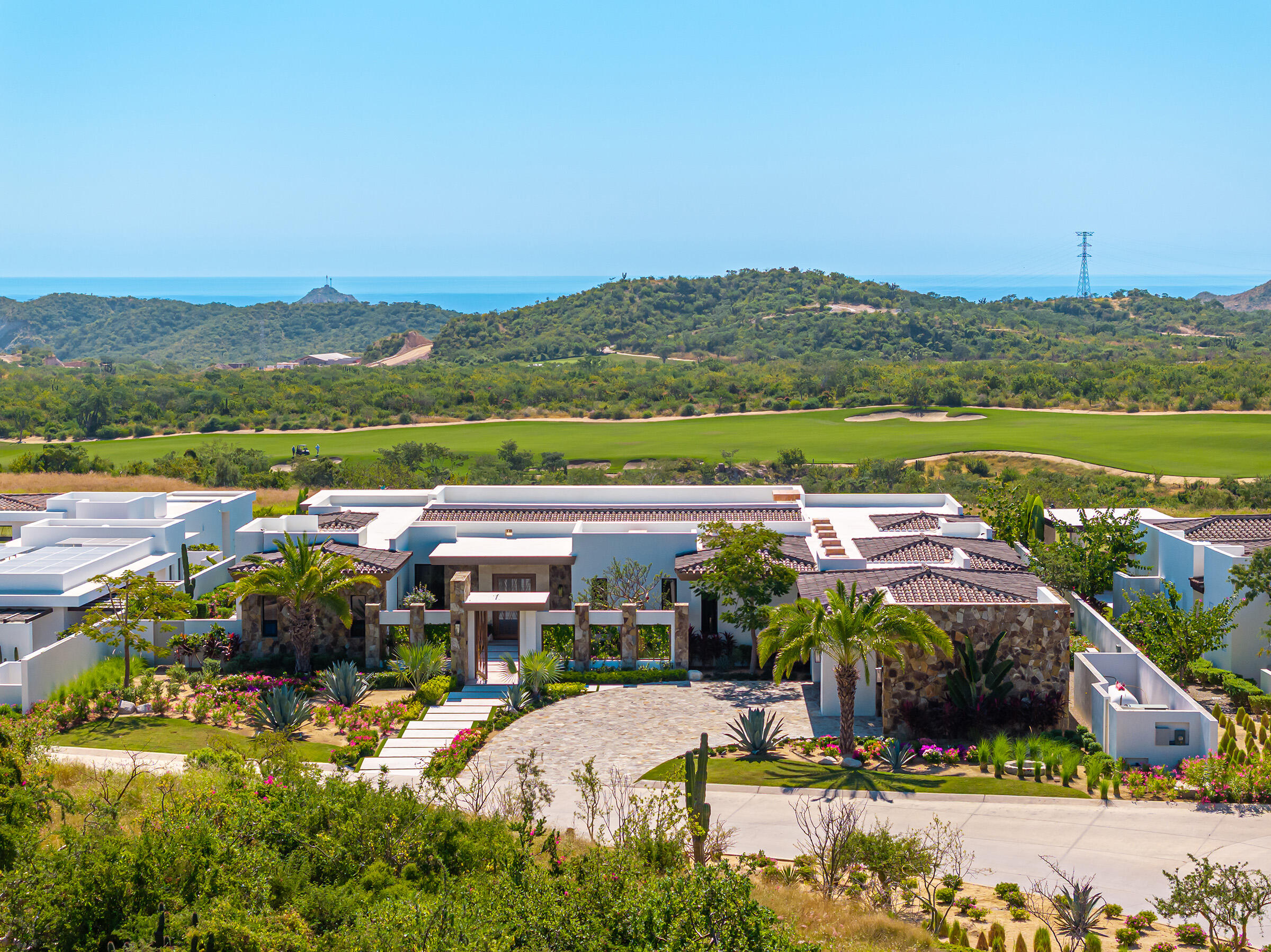 Cabo Luxury Section 10- El Parque Discover this exceptional new residence perfectly situated within the sought-after El Parque neighborhood of Querencia. Ideally located just a short walk from the clubhouse, this home offers the best of convenience and community living.Enjoy a large green space directly in front of the property, ideal for families with children or pets to play and explore. The setting captures beautiful golf course, mountain, and ocean for sale