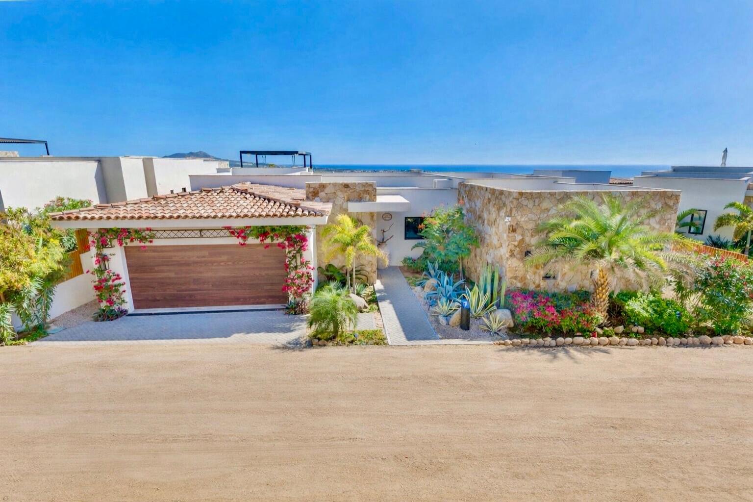 Cabo Luxury Las Terrazas Set along the 15th hole of the El Cardonal Golf Course, panoramic vistas extend from rolling fairways to the Pacific, delivering striking sunrises and sunsets.This four-bedroom, 4.5-bath home blends refined design with seamless indoor-outdoor living. Open-concept interiors feature Palecek furnishings, while each bathroom showcases hand-painted Mexican tile for warmth and authenticity.Outdoor living includes a private pool and elevated hot tub, outdoor grill and wet bar, lush landscaping, and expansive terraces with golf course and ocean for sale