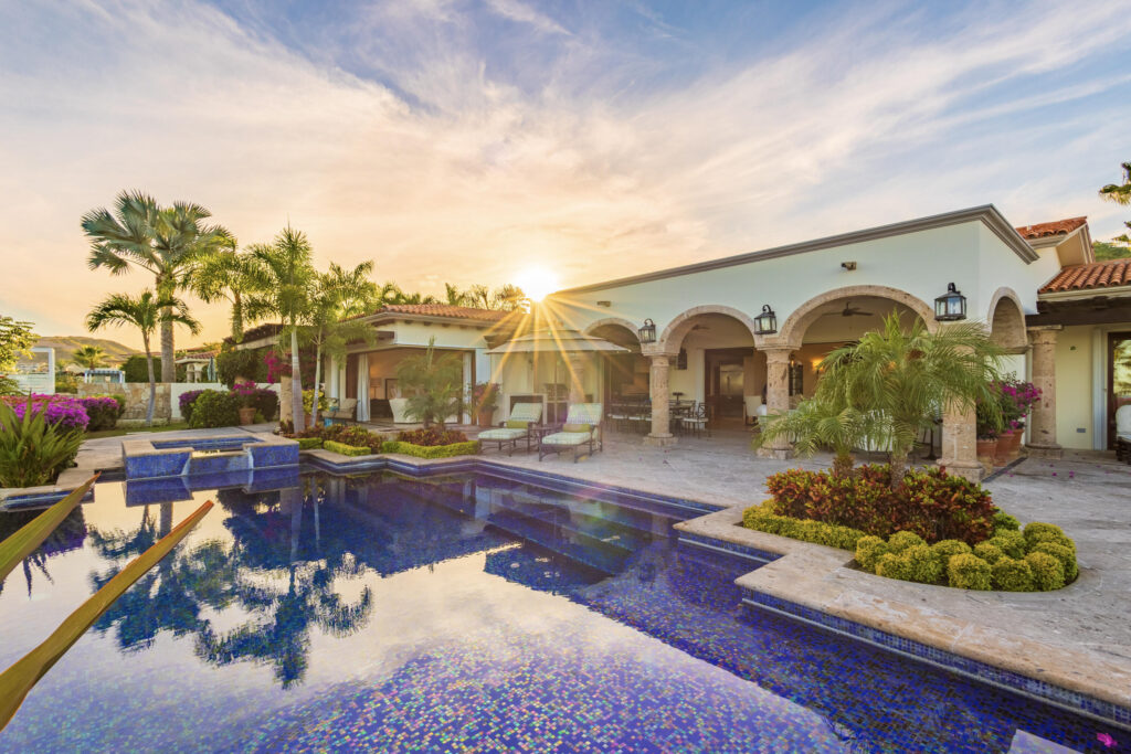 Cabo Luxury Caleta Loma Casa Plumeria is a beautifully designed, single-level 4-bedroom hacienda-style home located within the prestigious gated community of Caleta Loma in Palmilla. Thoughtfully upgraded while preserving its authentic Mexican charm, the home features three bedrooms in the main house and a separate casita located off the courtyard, ideal for guests or added privacy.You enter the home through a beautifully landscaped courtyard, surrounded by colorful plumerias and bougainvillea that carry throughout the entire property. The landscaping creates a high level of privacy and gives the home a peaceful, tucked-away feel, while still enjoying ocean – 74, Casa Plumeria, San Jose Corridor, San Jose Corridor, BS