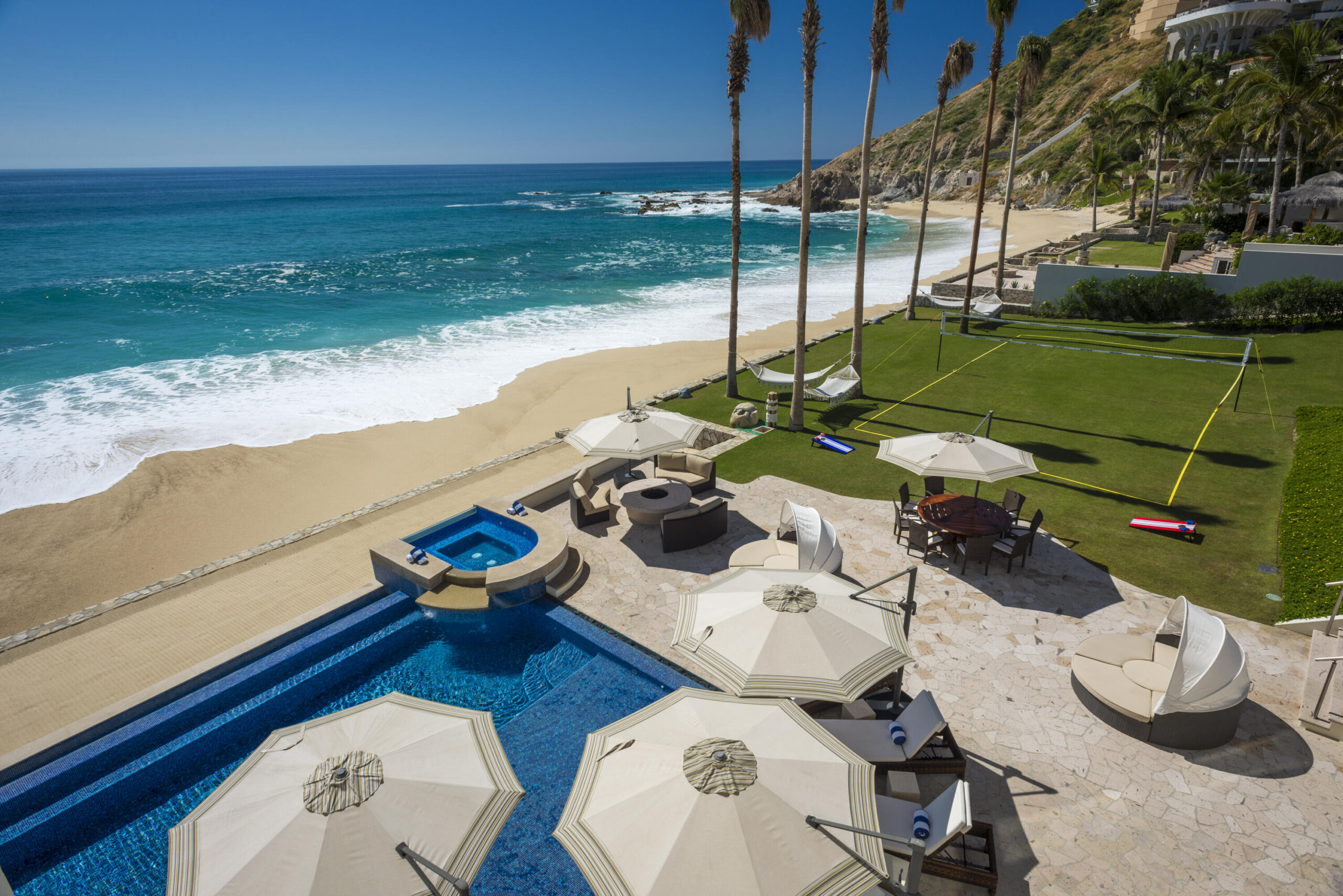 Cabo Luxury Palmilla Sur Rare true beachfront estate in Palmilla Sur featuring approximately 62 meters of ocean frontage. This exceptional residence offers 5 bedrooms, 5 full bathrooms, and 4 half bathrooms on a generous oceanfront lot. Expansive decks and patios provide breathtaking, unobstructed ocean – Casa del Mar Palmilla Sur, San Jose Corridor, San Jose Corridor, BS