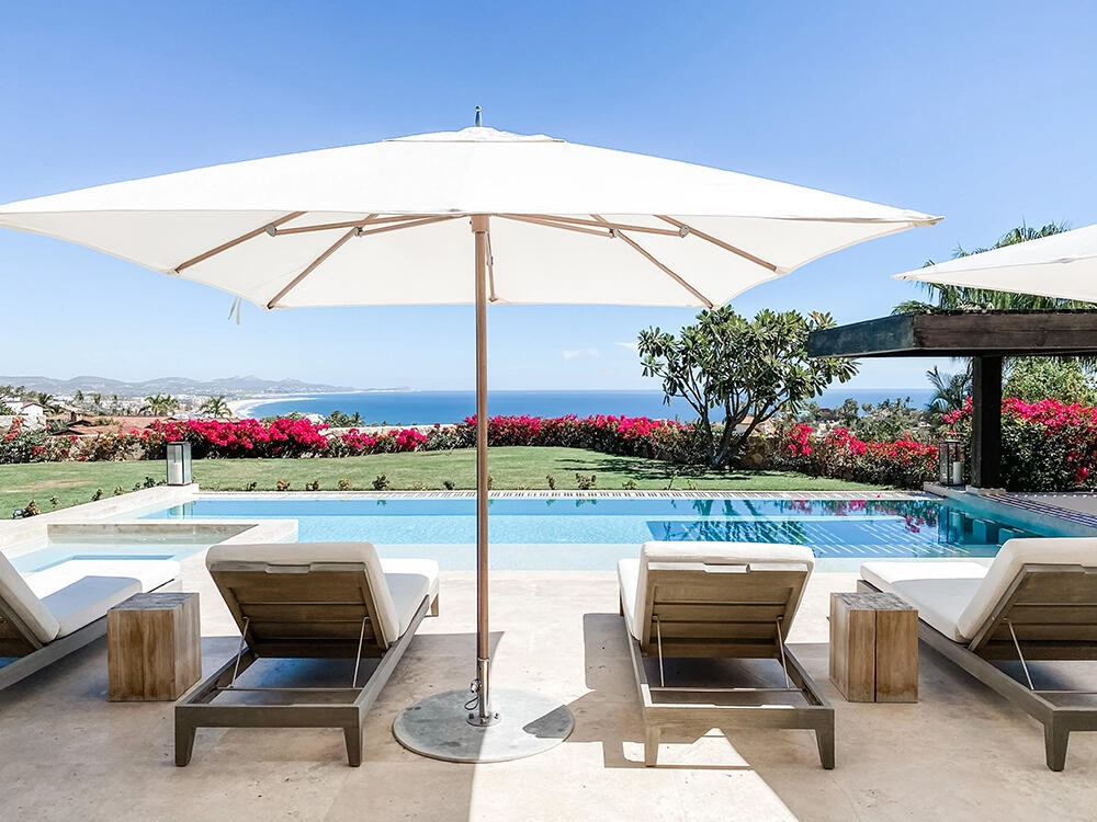 Cabo Luxury Section 1- Las Colinas Casa Sueños is an extraordinary 10-bedroom estate, thoughtfully designed to embrace large-scale living within Querencia.The property welcomes you into the main house and is composed of a separate casita located just steps away, together functioning as one unified residence. The main house features expansive indoor and outdoor living areas, seven spacious bedrooms, outdoor showers, a generous pool terrace, and unobstructed – Colinas 21, San Jose Corridor, BS