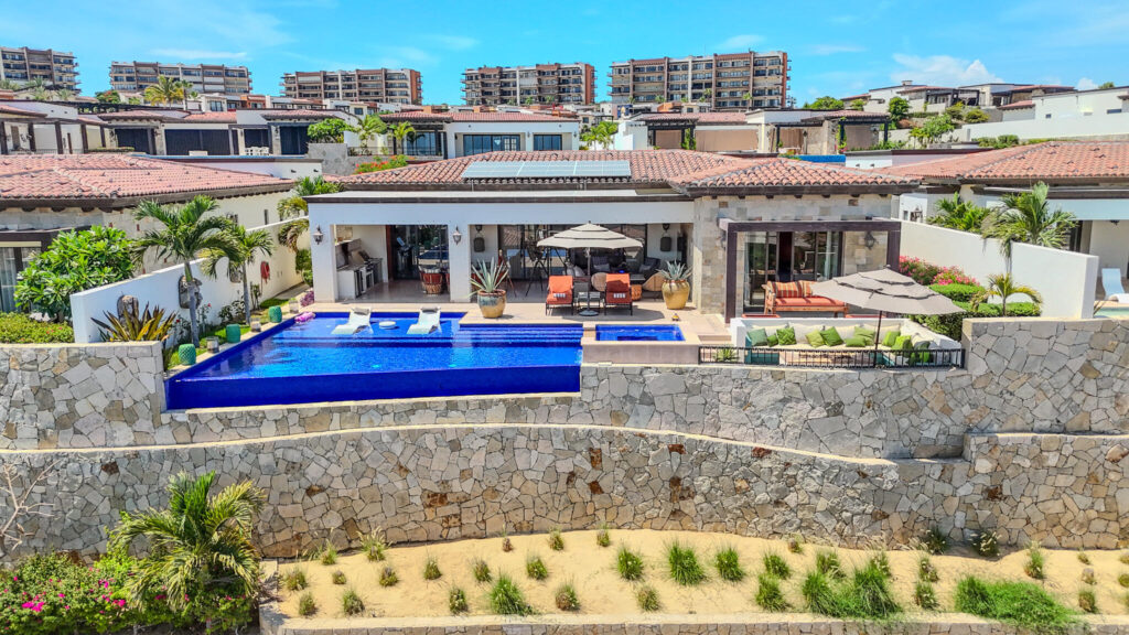 Cabo Luxury Coronado Nestled within the prestigious Quivira Golf and Resort community along Cabo's breathtaking Pacific Coast, Coronado 4.6 is a single-level Hacienda-style residence that embodies refined coastal living.This beautifully designed home features four spacious bedrooms, soaring vaulted ceilings, and seamless indoor-outdoor transitions that invite the beauty of the ocean into every space. Expansive outdoor living areas - including a private pool, jacuzzi, wood burning fireplace, fire table, and multiple lounge spaces - are perfectly positioned to capture uninterrupted ocean – Coronado 4.6, Pacific, BS