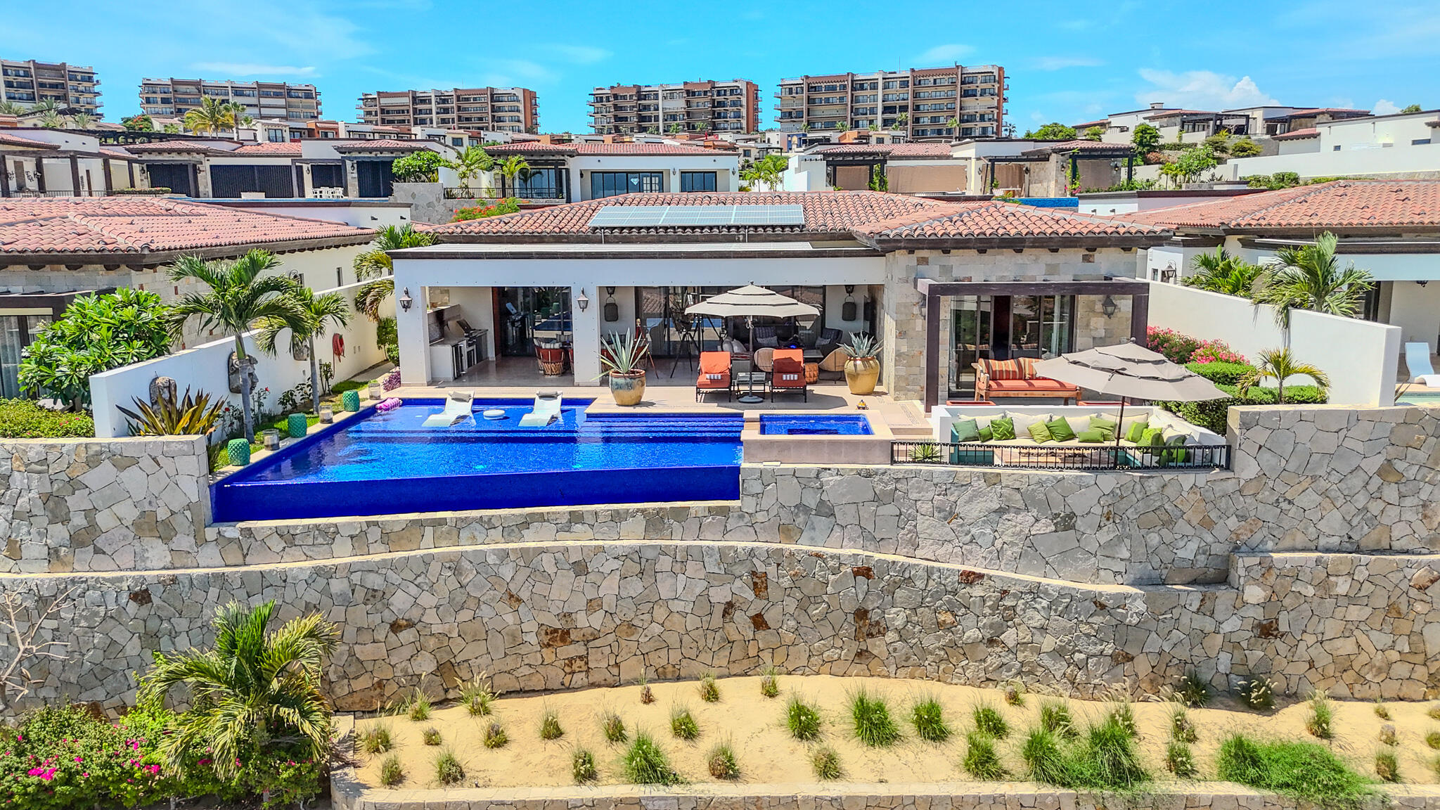 Cabo Luxury Coronado Nestled within the prestigious Quivira Golf and Resort community along Cabo's breathtaking Pacific Coast, Coronado 4.6 is a single-level Hacienda-style residence that embodies refined coastal living.This beautifully designed home features four spacious bedrooms, soaring vaulted ceilings, and seamless indoor-outdoor transitions that invite the beauty of the ocean into every space. Expansive outdoor living areas - including a private pool, jacuzzi, wood burning fireplace, fire table, and multiple lounge spaces - are perfectly positioned to capture uninterrupted ocean for sale