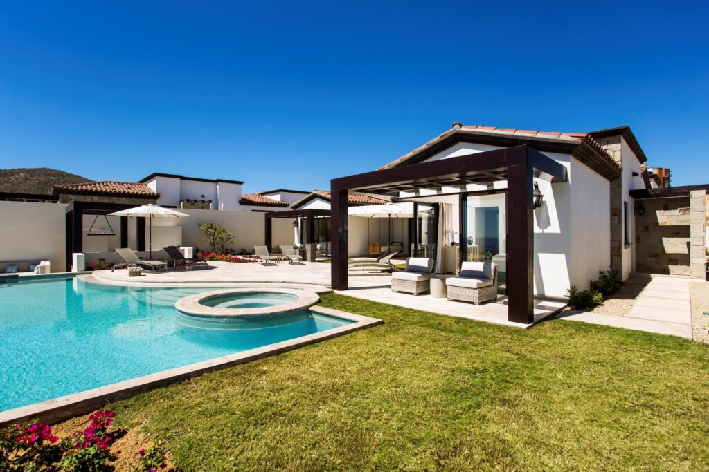 Cabo Luxury Coronado Espejo 4 bed home plan , this floorplan boasts a great room with vaulted ceilings over the living/dining/kitchen area which looks out over the large covered terrace and the hand-made infinity edge pool beyond. The chefs kitchen with huge island with seating boasts Wolf and Sub-Zero appliances. The master and guest master have large ensuite baths w/ shower and tubs, and also both have ocean – Espejo 4 bedroom estate home, Pacific, BS