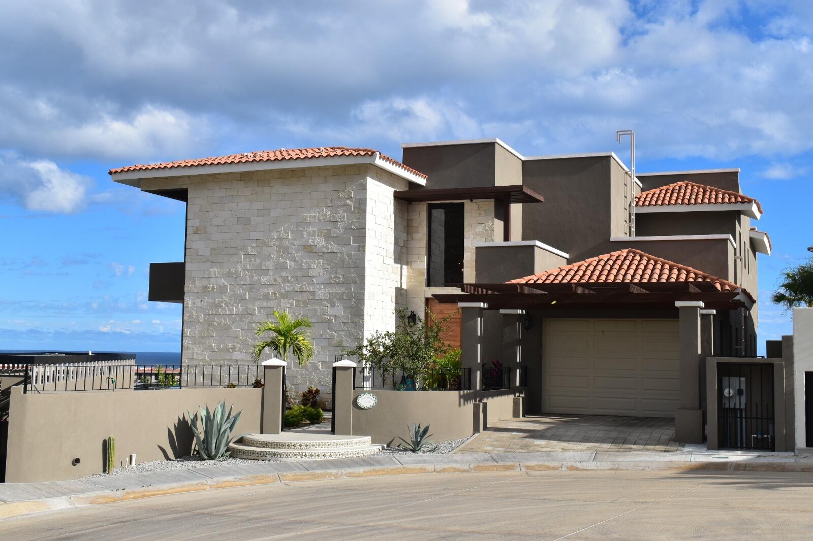 Cabo Luxury Vista Lagos This beautiful fully furnished property, named ''Casa de Hermanos,'' is built on two levels and features 5 bedrooms and 6 bathrooms, an entertainment room, and a two-level entry. The living room and dining room (with seating for 10) open to a very large kitchen and a service area. On the terrace there is a pool with a Jacuzzi, a fire pit area with sun loungers, and a Kitche with a BBQ Area, including Sink & Fridge. Most extraordinary are the for sale