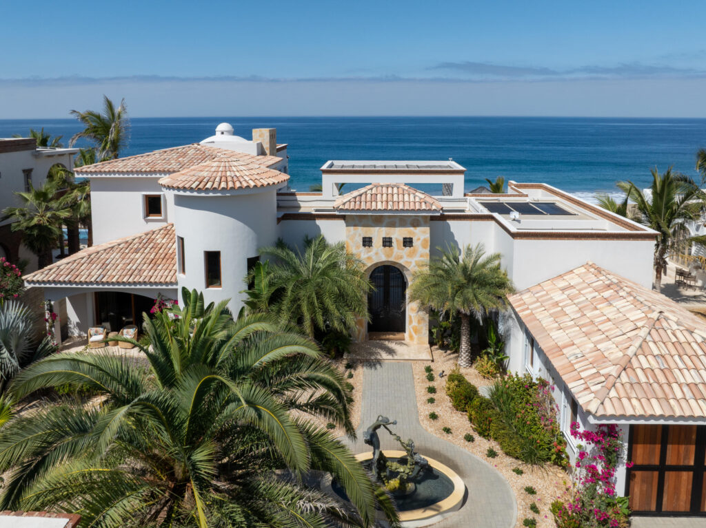 Cabo Luxury Rancho Nuevo This is a one of a kind estate property consisting of two oceanfront homes. The oceanfront estate with 3 grand bedrooms/4.5 baths, interior/exterior living, 2 kitchens, 2 dining areas, butler's pantry, 2 laundry rooms, and attached garage. Two primary suites are situated upstairs and downstairs.. No expense was spared in exquisite high end finish out such a brick bovedas, brick barrel kitchen ceiling, Heston appliances.Onyx countertops with hidden electrical outlets. This estate was built with the highest quality of materials and design. Dual pane hurricane doors and windows plus hurricane shutters encompassing even the covered patio. The orientation is perfectly situated to capture the Pacific, which sits on 3000m2 lot, walled with electronic gated car gate located high on a bluff. See mo Imagine only 35 minutes from Cabo San Lucas and 15 minutes from Todos Santos, lies the oceanfront gated community known as Rancho Nuevo. This one of a kind estate property consists of an oceanfront home with 3 oversized suites all with luxurious en suite bathrooms, walk-in closets, of which two are oceanfront. The upstairs primary has two terraces, one with built in seating compete with a fire pit. The home was constructed with the highest quality materials and orientation to take in the ocean – Ocean Drive, Pacific, BS