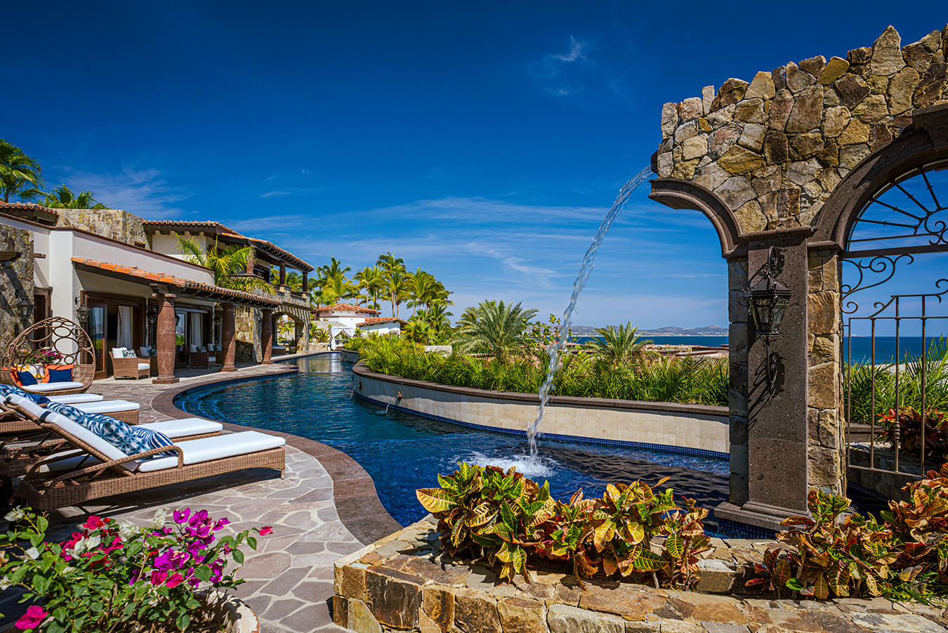Cabo Luxury Palmilla Cove Villa Encanto, located at Palmilla Cove 5, offers a traditional design with hints of Old Hacienda Architecture, captured in the stone façade and archways throughout. The home offers a calming neutral palette, comfort, and practicality.A bit of wow comes into play with the 100' plus sprawling pool. Flowing the length of the home, the pool features a centrally located sunken spa, wet shelf, spitter fountains and cascading waterfall. Multi outdoor gathering spots are scattered throughout, offering places for lounging or leisurely long lunches, and even sneaking away to a quiet spot.The approach with the interior was to capture the ocean for sale