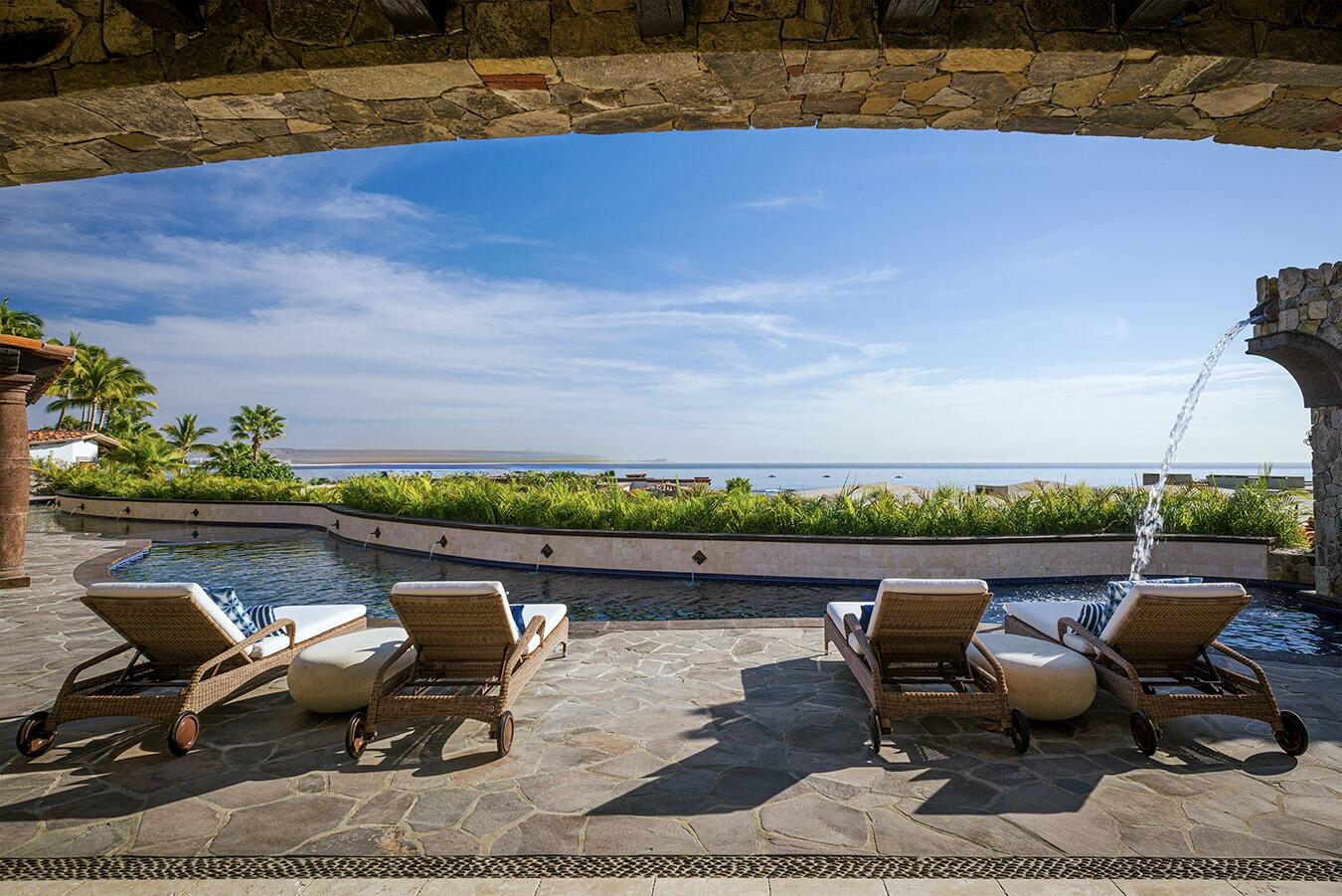 Cabo Luxury Pedregal Csl First time on the market, Villa Antigua is a six-bedroom, seven-bathroom residence located within the prestigious community of Pedregal, offering a rare opportunity to own a timeless property in Cabo's most exclusive neighborhood.Antigua blends classic Mexican architecture with hacienda-style furnishings, creating an atmosphere of inviting and understated luxury. Dramatic architectural details and exceptional craftsmanship are evident throughout, including stone columns, marble floors, and tasteful designer décor in warm earth tones.Its spacious layout includes six generously sized bedrooms, ideal for both private enjoyment and high-end rental use. The upper level bedrooms provide enhanced privacy, beautiful ocean for sale